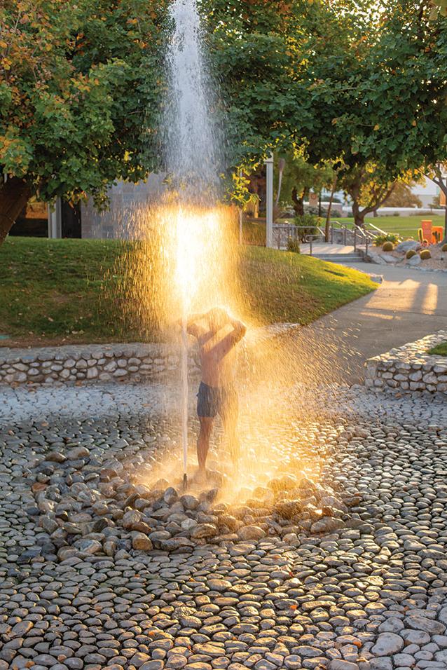student bathing in fountain